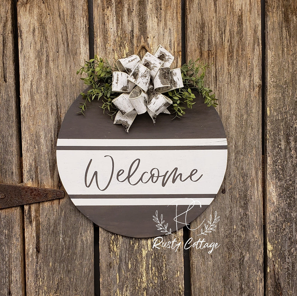 Welcome Door Hanger with bow and greenery
